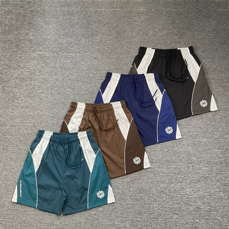 Broken planet, trendy high street, retro sports and leisure, summer color blocking splicing, woven quick drying shorts for men