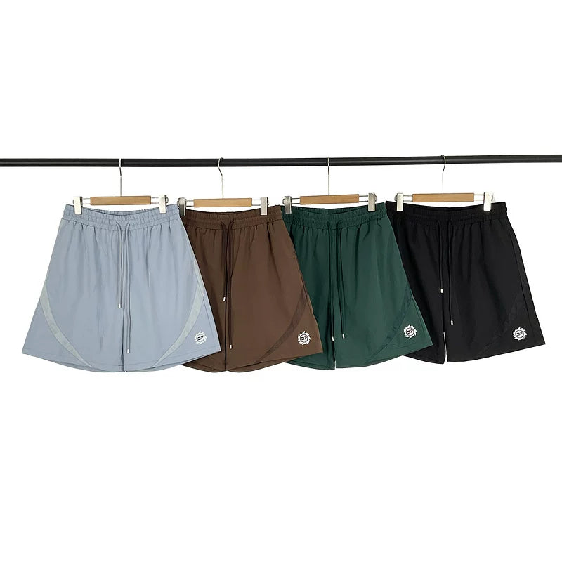 Broken Planet European and American fashion brand summer embroidery logo splicing design beach quick drying sports shorts for men