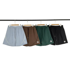 Broken Planet European and American fashion brand summer embroidery logo splicing design beach quick drying sports shorts for men