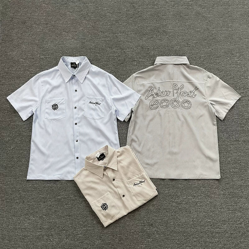 Broken Planet, a niche European and American fashion brand, features summer letter logos embroidered with loose stripes and short sleeved shirts