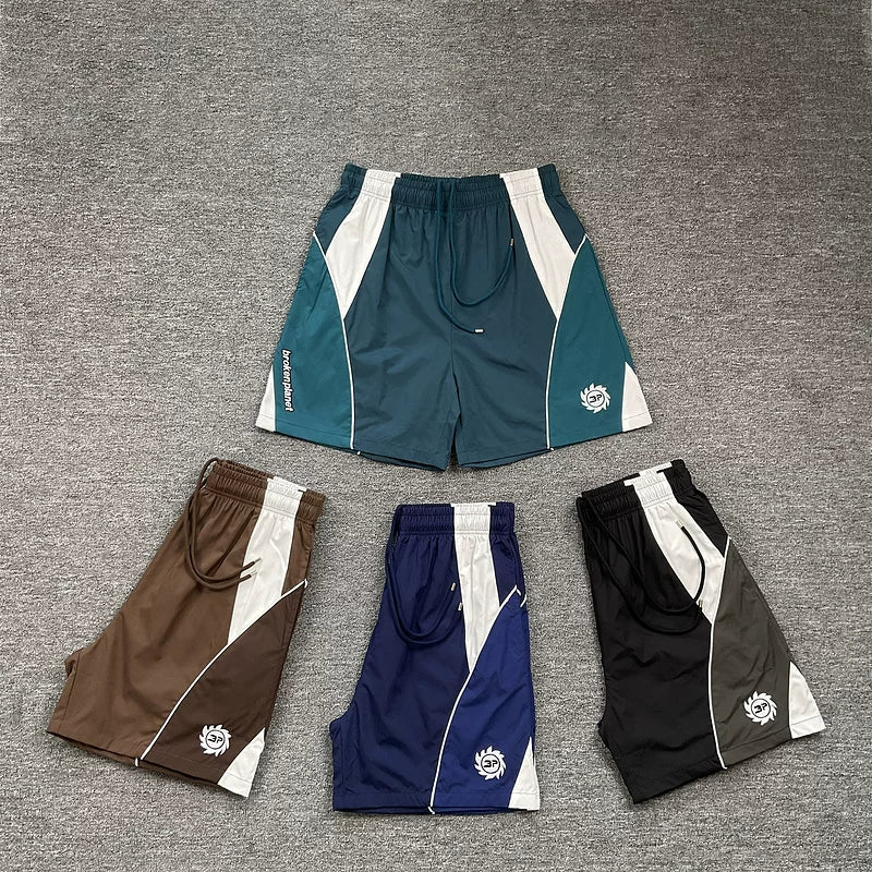 Broken planet, trendy high street, retro sports and leisure, summer color blocking splicing, woven quick drying shorts for men
